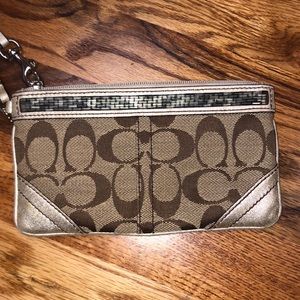 Coach wristlet gold